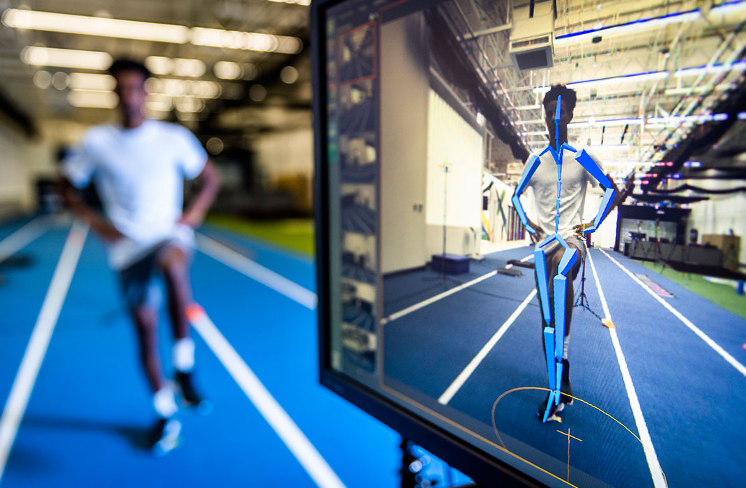 male athlete undergoing a performance test on track