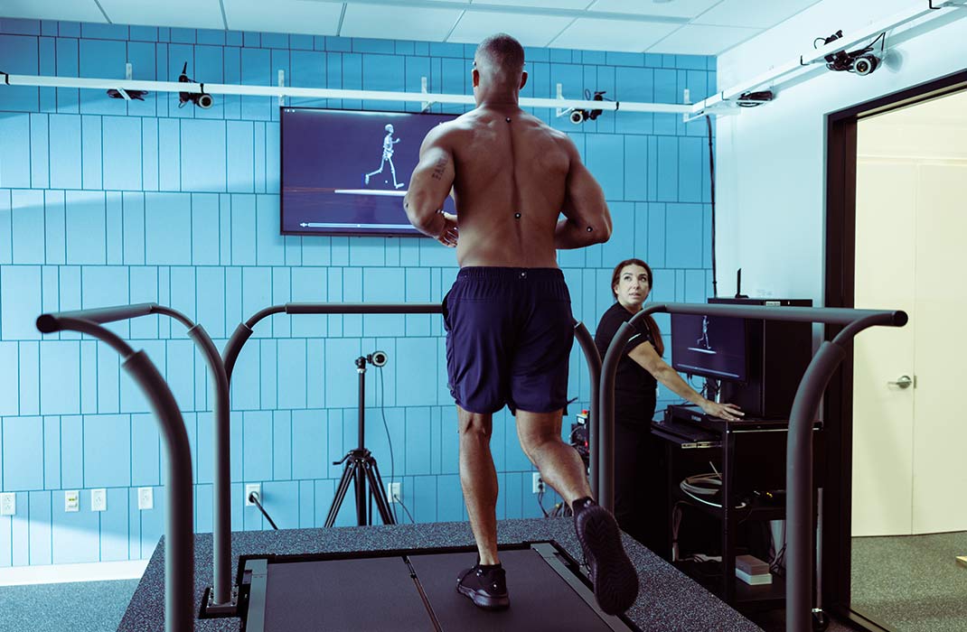male athelete undergoing a running assessment on a treadmill