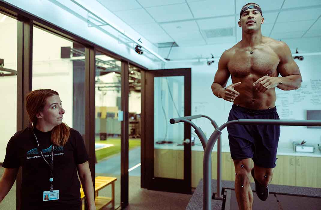 male athlete undergoing a running assessment on a treadmill