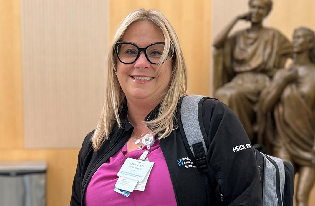 female medical provider wearing a backpack